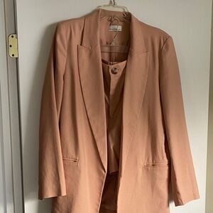 Be cool Blazer/short set size L. I’d say peach in color or like a dusty rose.